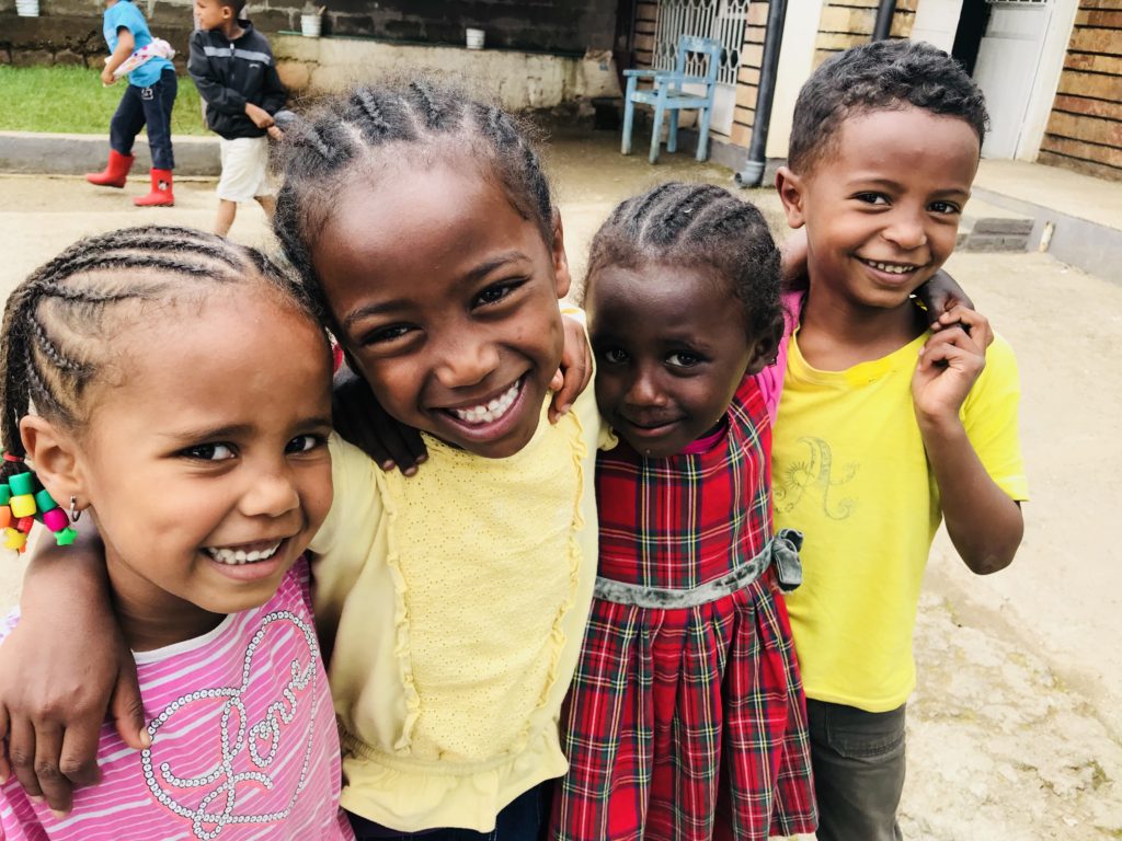 Group of children smiling together