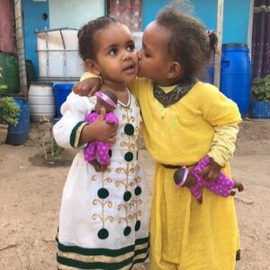 two small girls hugging